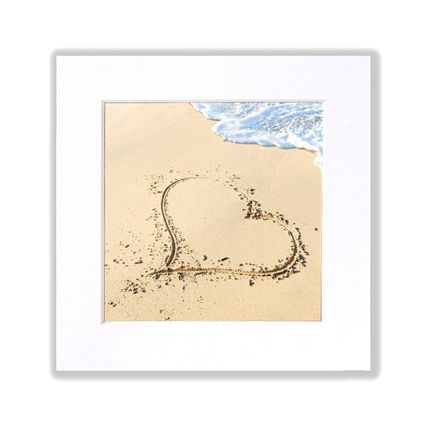 Photo cœur sur le sable